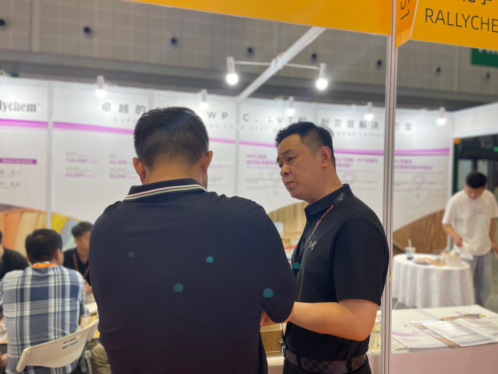 Customer discussion at the Rallychem DOMOTEX booth-02.jpg