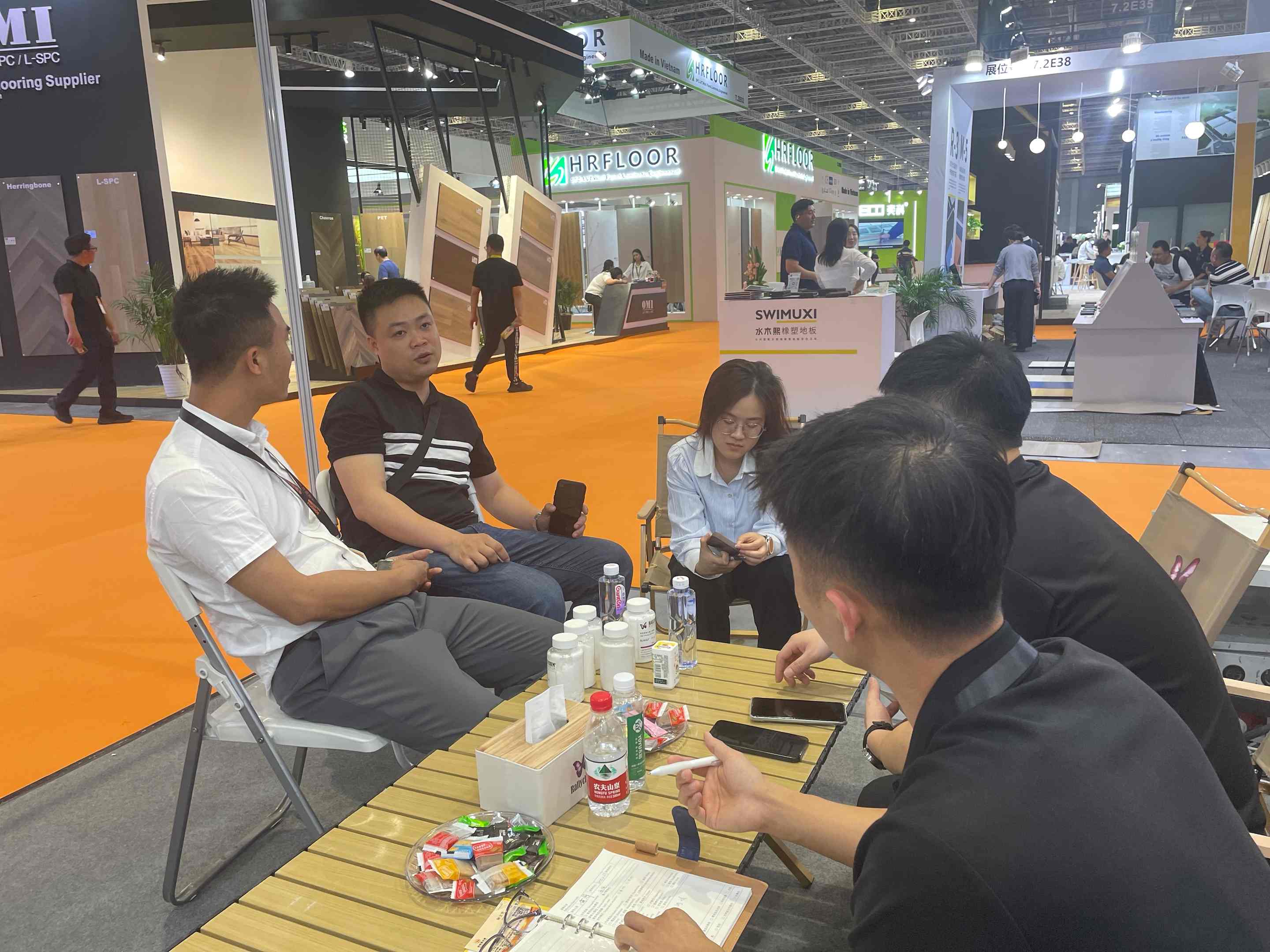Customer discussion at the Rallychem DOMOTEX booth-03.jpg