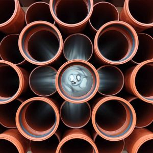 What causes the uneven wall thickness of PVC pipes?